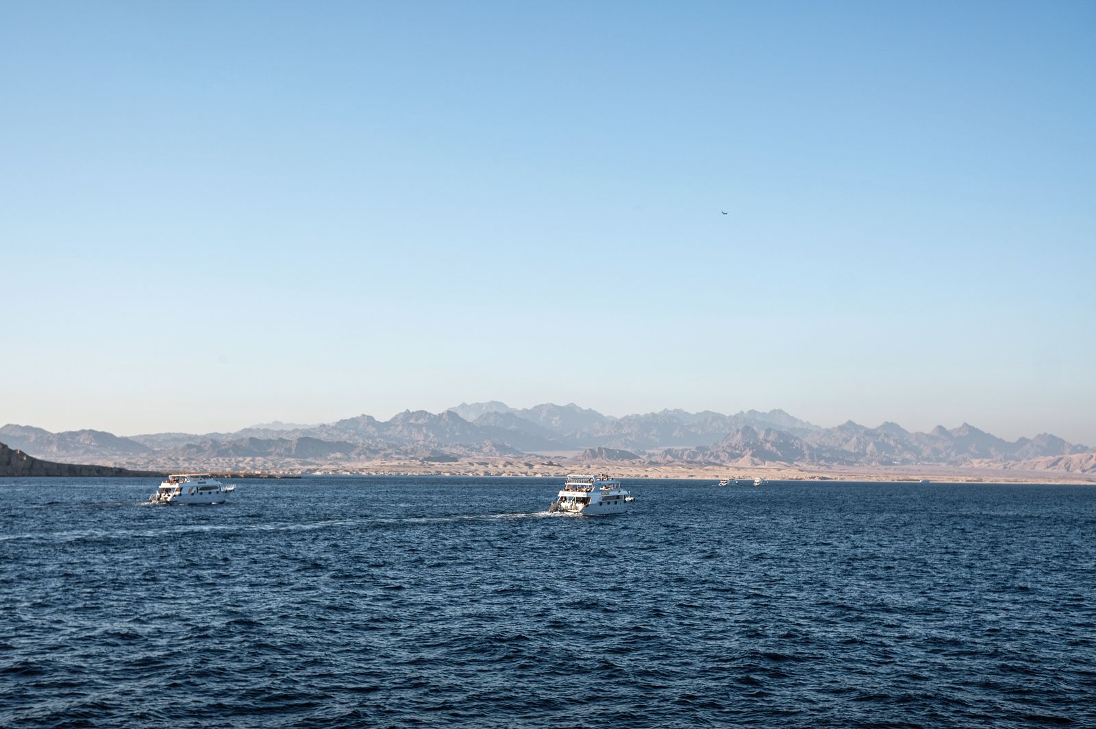 Boats on the Red Sea near mountains